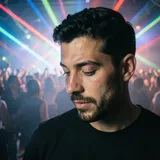 Orange light resting on shoulder and knee — DJ Zonke cover art